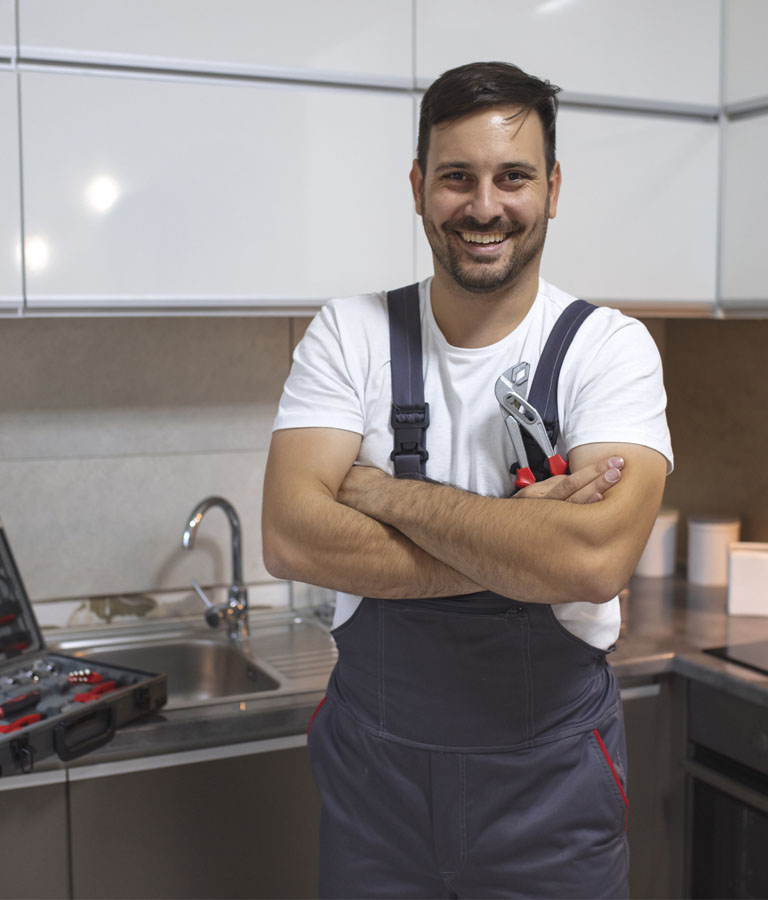 Plumber inside kitchen